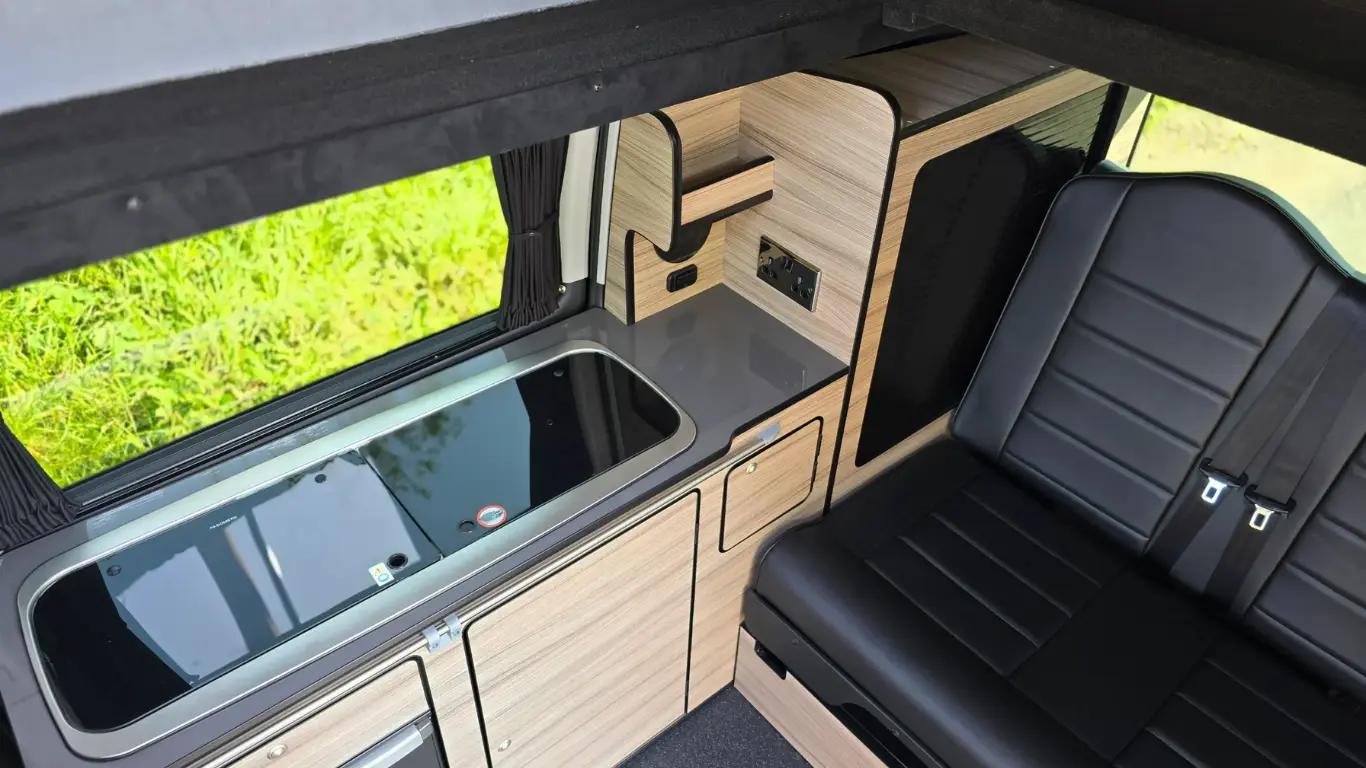 view of inside a Free Spirit campervan taken from the pop top roof