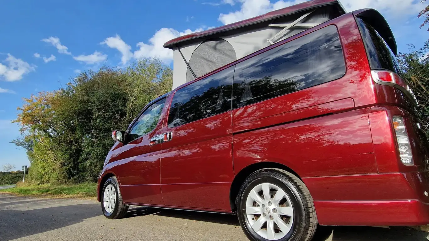 Red Nissan Elgrand JDN campervans UK with roof up