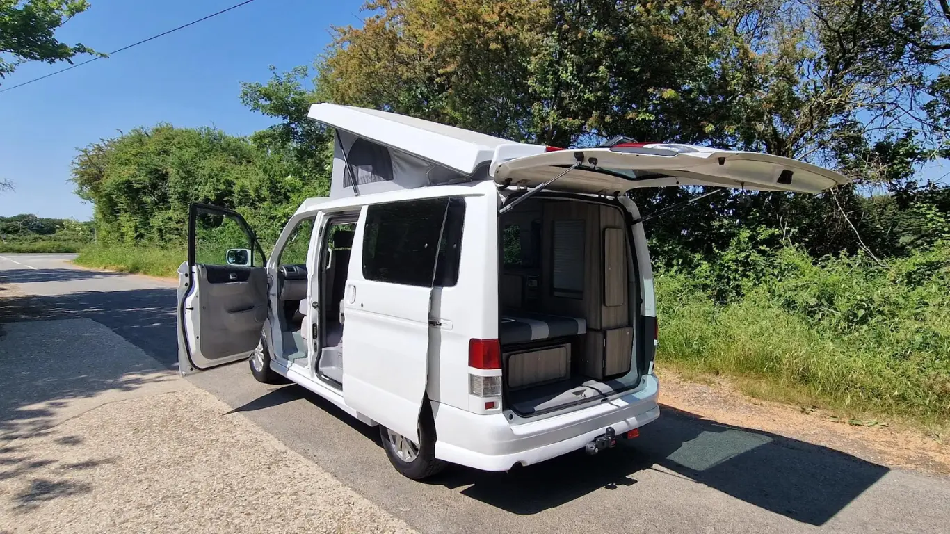 White Mazda Bongo JDM campervans UK with pop top roof up and door open
