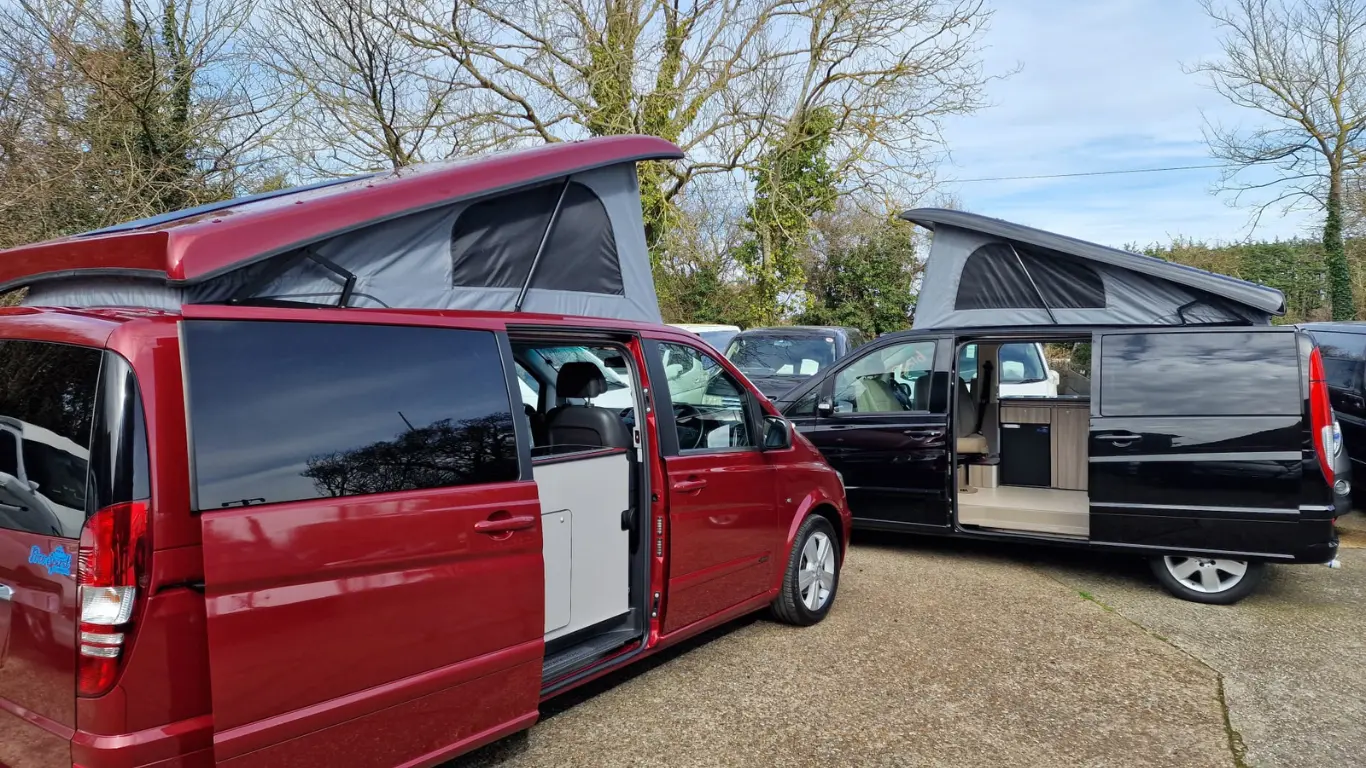 Red and black automatic campervans