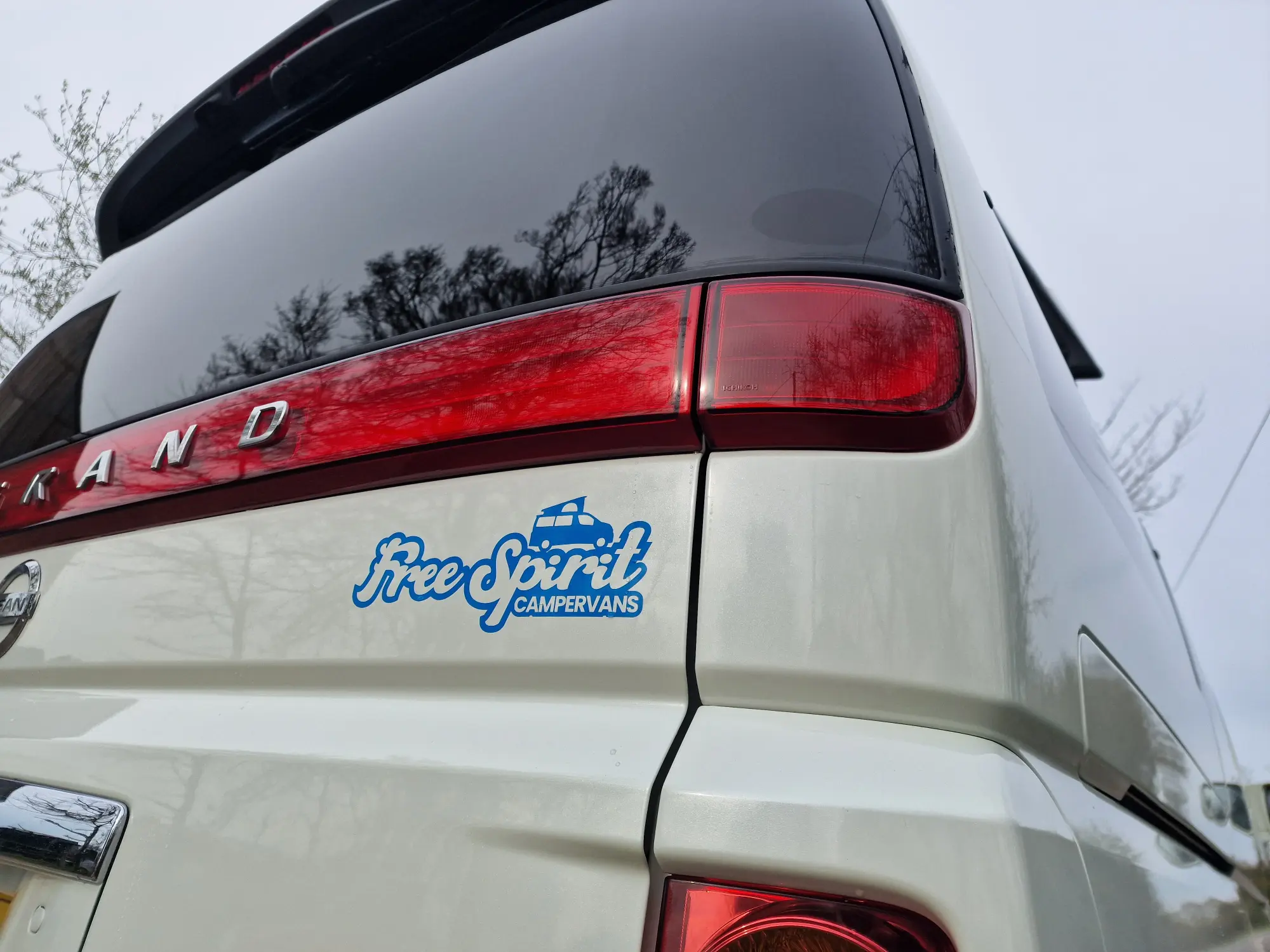 rear of a white Nissan Elgrand Free Spirit campervan